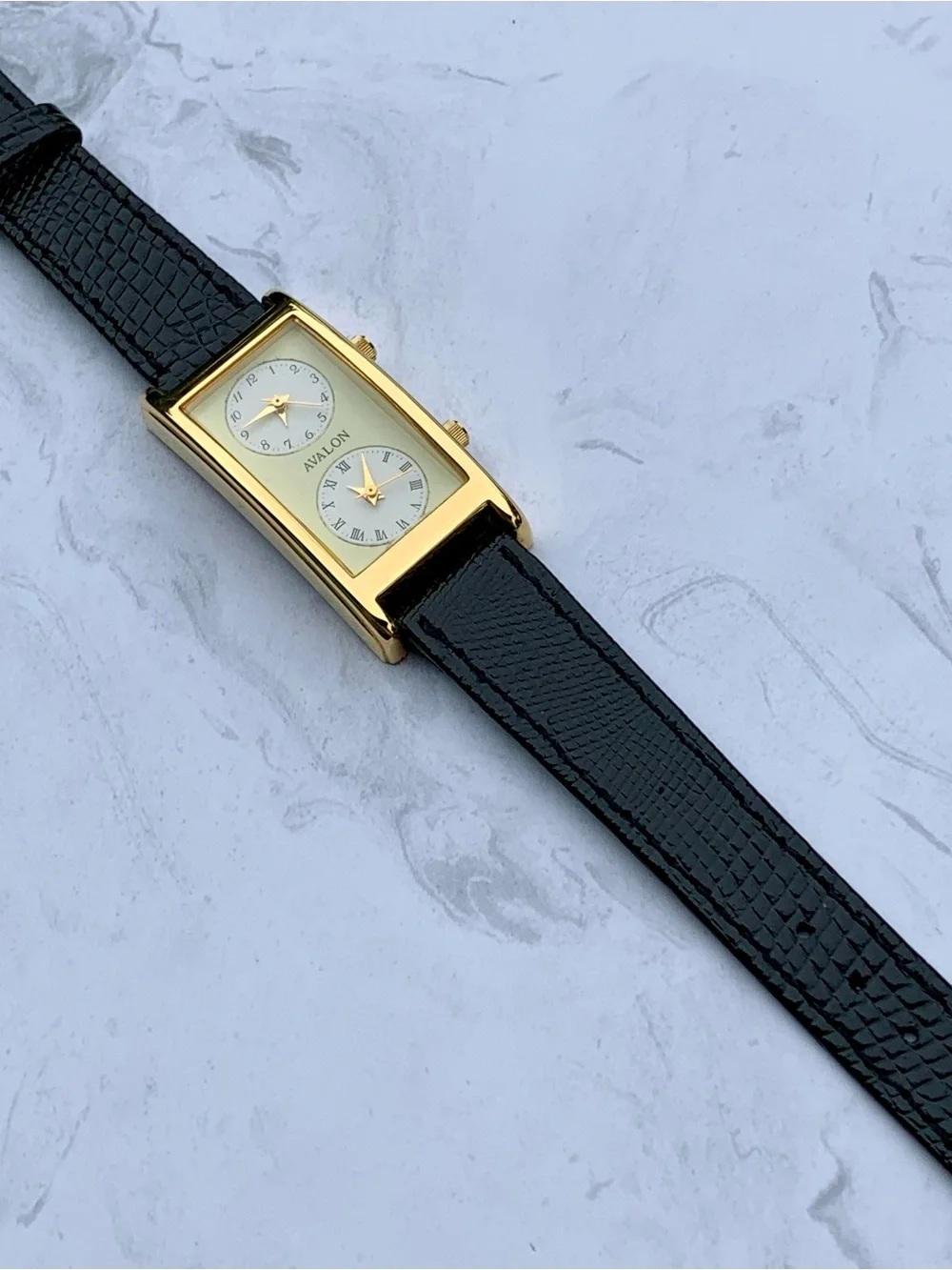 Avalon by Citizen Gold-Tone Rectangular Dual Dial Watch with Black Strap